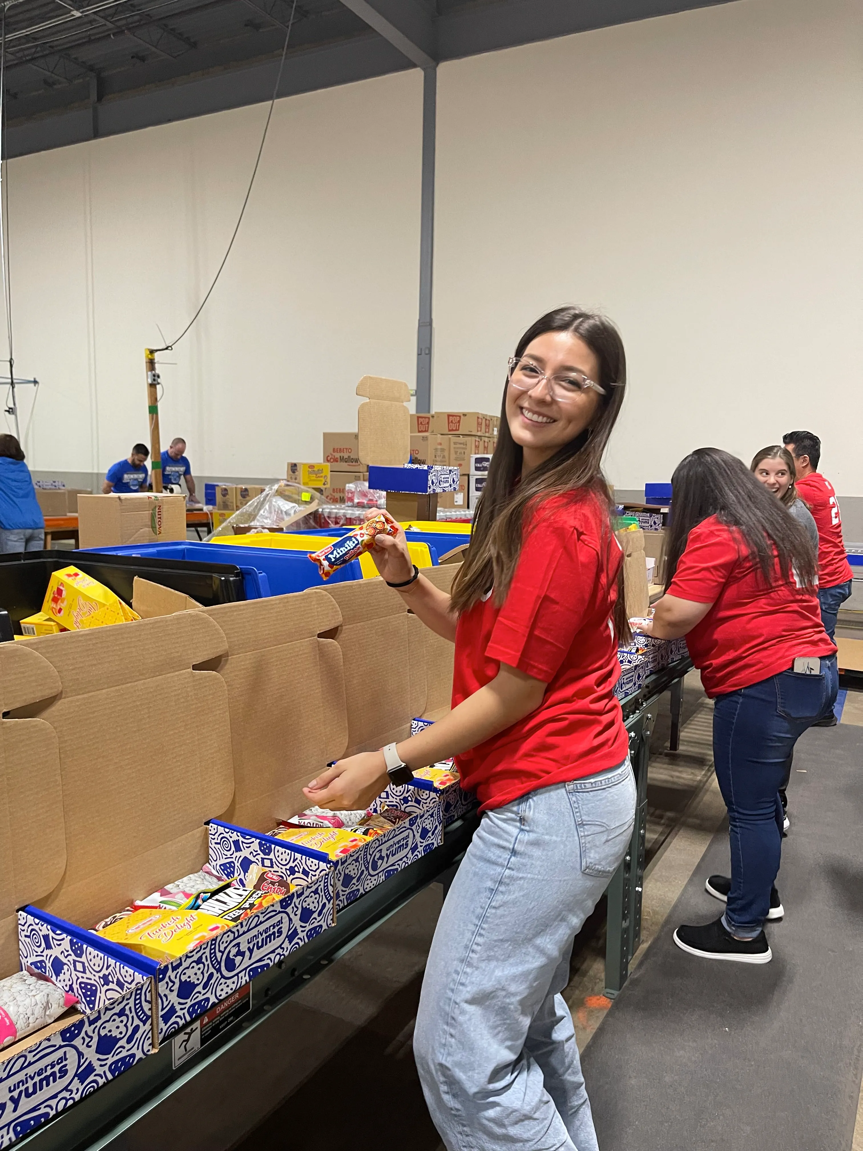 Photo of Maria packing boxes